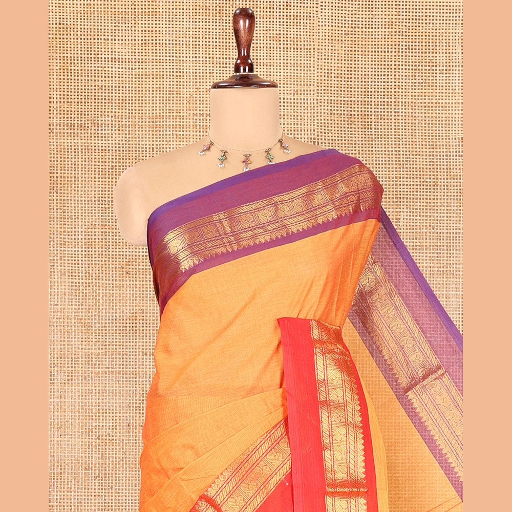 Pothys Mustard Plain Chettinad Cotton Saree, a Contrast Kal Eragina Traditional Ganga-Jamuna Border, Striped Pallu, and a Matching Blouse