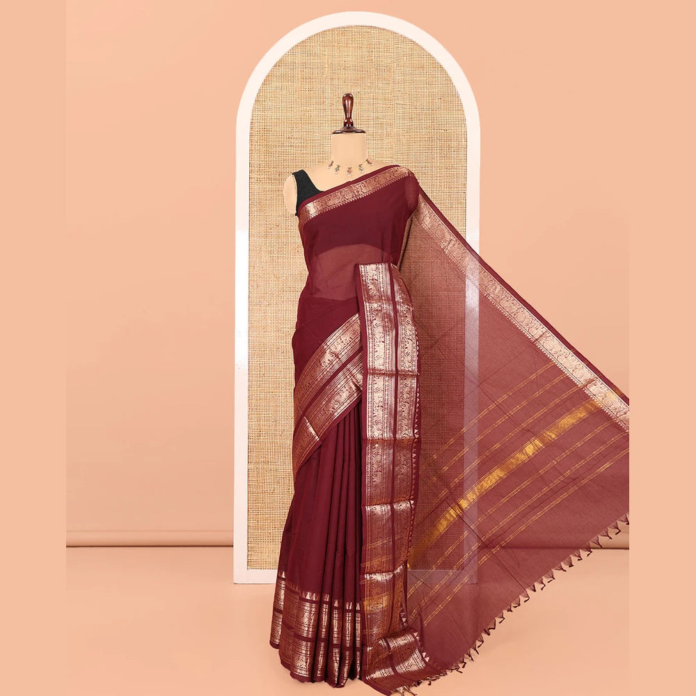 Pothys Brown Plain Chettinad Saree, Gleamed Up with a Zari Rettai Pettu Traditional Border, Striped Pallu, and a Matching Blouse