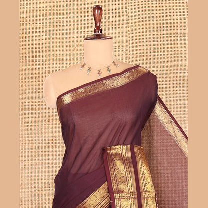 Pothys Coffee Brown Plain Chettinad Cotton Saree, Highlighted by Rettai Pettu Peacock-Elephant Border, a Matching Blouse