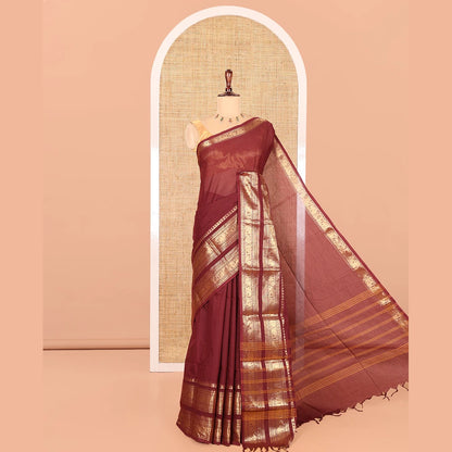 Pothys Maroon Plain Chettinad Cotton Saree, Highlighted by Rettai Pettu Peacock-Elephant Border, a Matching Blouse