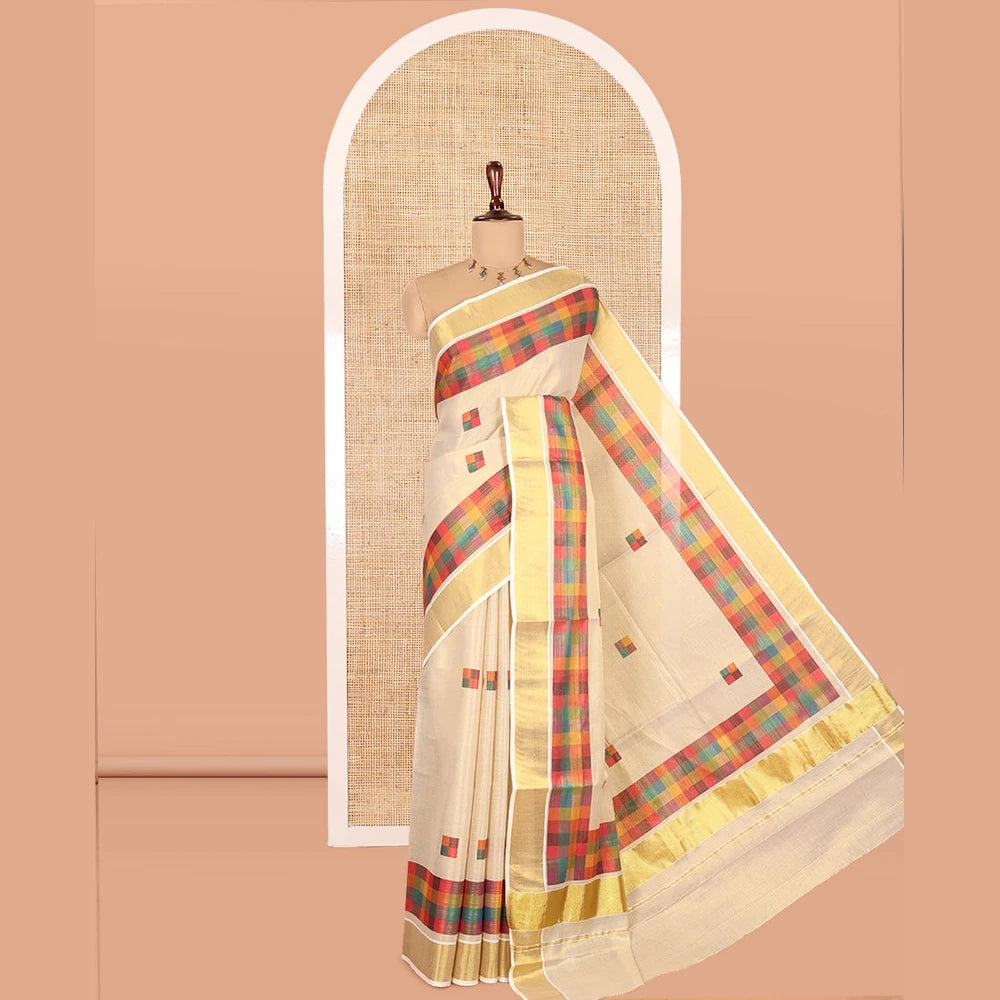 Pothys Gold-Purple Kerala Tissue Cotton Saree Features Madras Checked Buttas, a Zari Checked Border, and a Contrast Blouse
