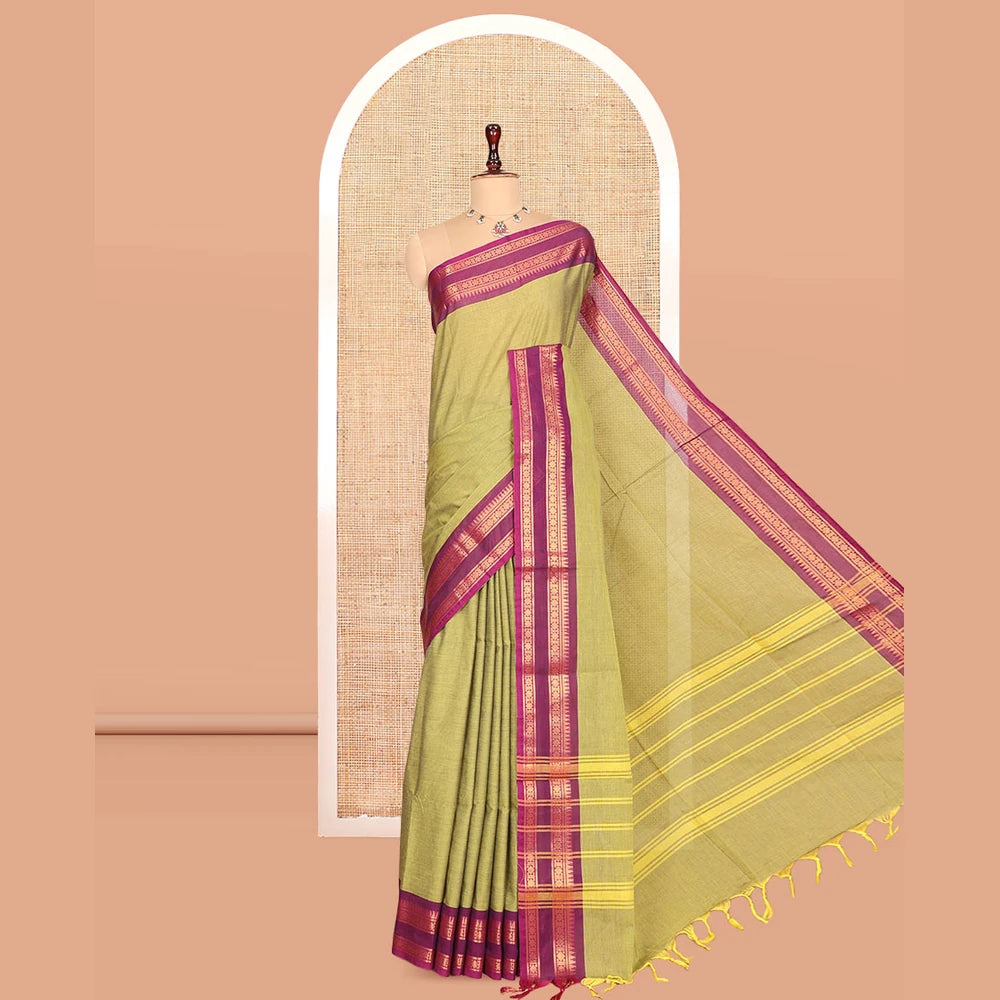 Pothys Green Plain Chettinad Cotton Saree, Complemented by a Contrast Rettai Pettu Traditional Zari Border, Striped Pallu, and a Matching Blouse