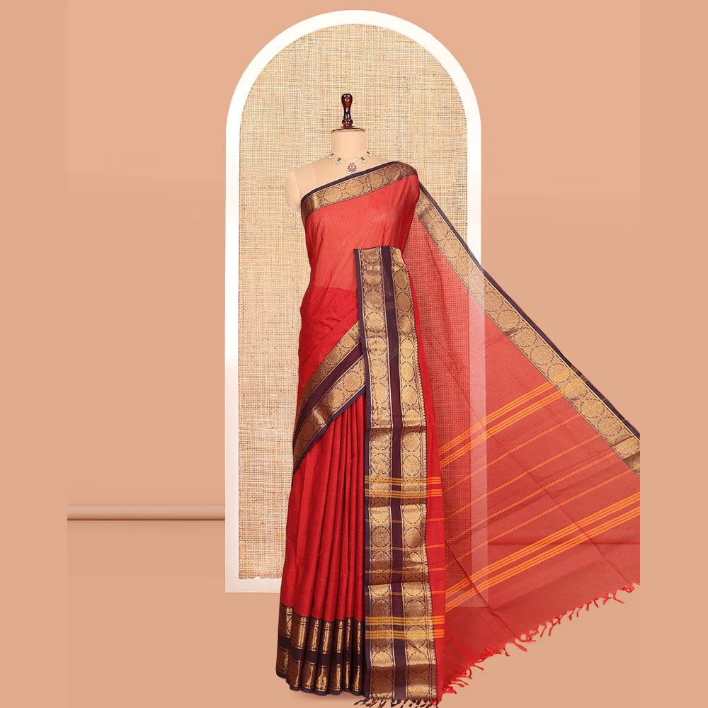 Pothys Rust Plain Chettinad Cotton Saree, Complemented by a Contrast Rettai Pettu Traditional Zari Border, Striped Pallu, and a Matching Blouse