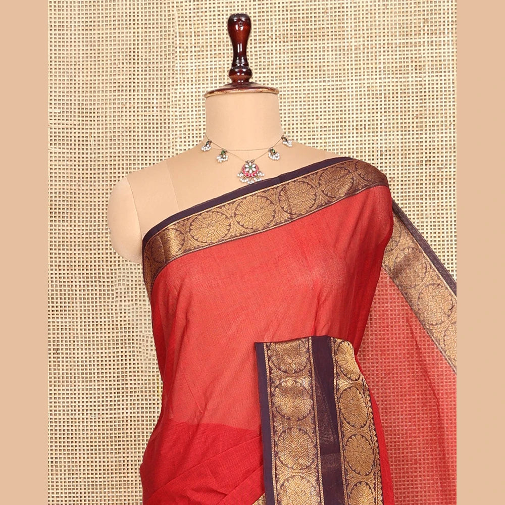 Pothys Rust Plain Chettinad Cotton Saree, Complemented by a Contrast Rettai Pettu Traditional Zari Border, Striped Pallu, and a Matching Blouse