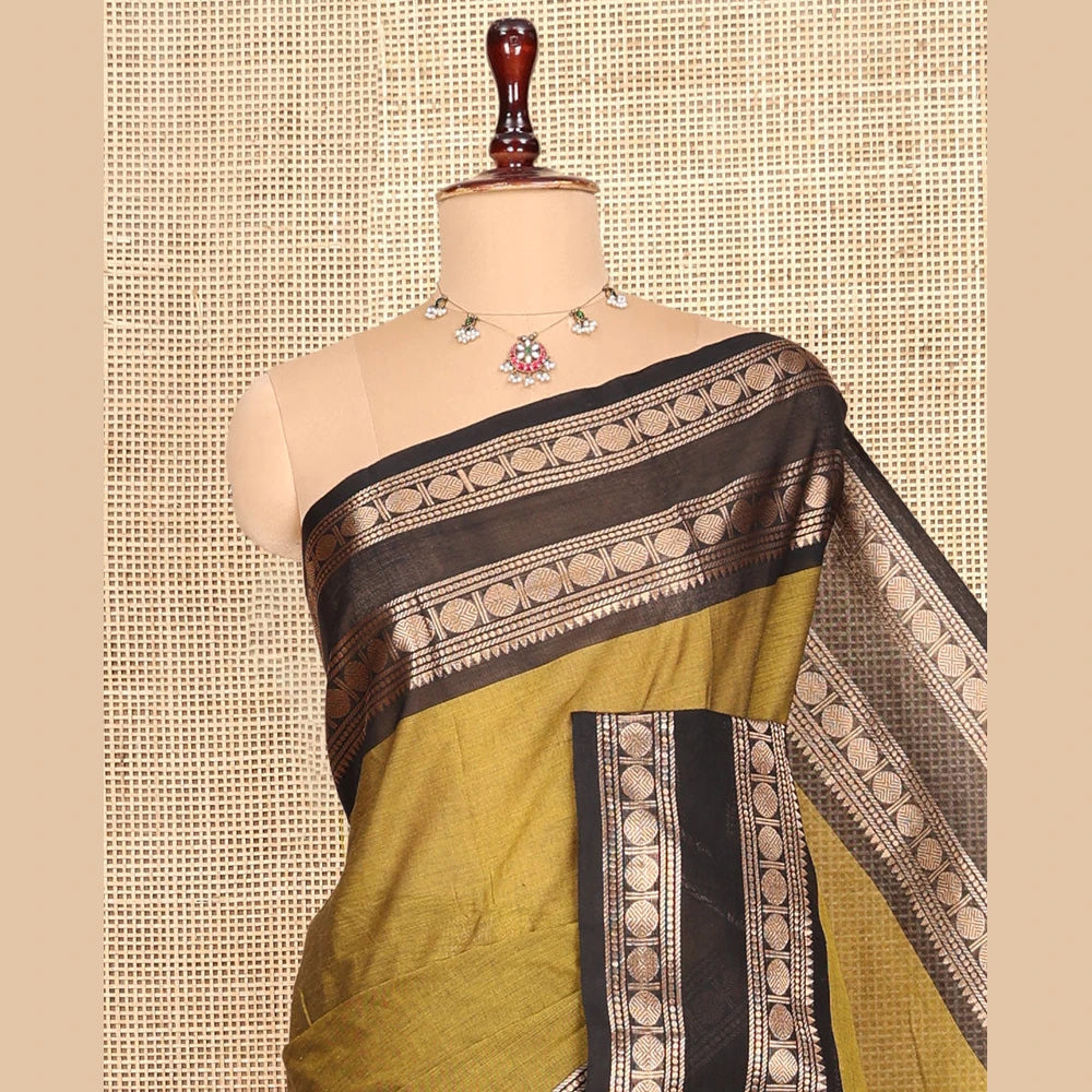 Pothys Green Plain Chettinad Cotton Saree, Complemented by a Contrast Rettai Pettu Rudraksham Zari Border, Striped Pallu, and a Matching Blouse