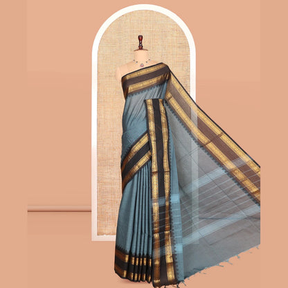 Pothys Grey Plain Chettinad Cotton Saree, Complemented by a Contrast Traditional Zari Rettai Pettu Border, Striped Pallu, and a Matching Blouse