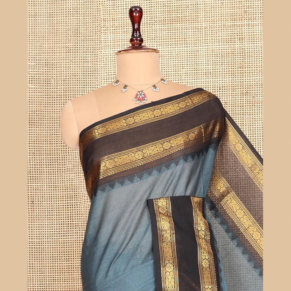 Pothys Grey Plain Chettinad Cotton Saree, Complemented by a Contrast Traditional Zari Rettai Pettu Border, Striped Pallu, and a Matching Blouse