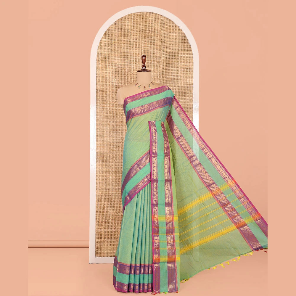 Pothys Sea Green Plain Chettinad Cotton Saree, Complemented by a Contrast Rettai Pettu Traditional Border, Striped Pallu, and Matching Blouse