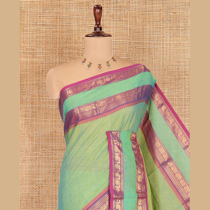 Pothys Sea Green Plain Chettinad Cotton Saree, Complemented by a Contrast Rettai Pettu Traditional Border, Striped Pallu, and Matching Blouse