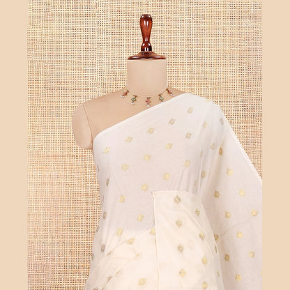 Pothys Borderless Cream Kerala Cotton Saree, Adorned with Zari Buttas, a Self-Pallu, and a Matching Blouse