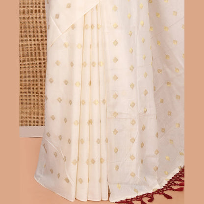 Pothys Borderless Cream Kerala Cotton Saree, Adorned with Zari Buttas, a Self-Pallu, and a Matching Blouse