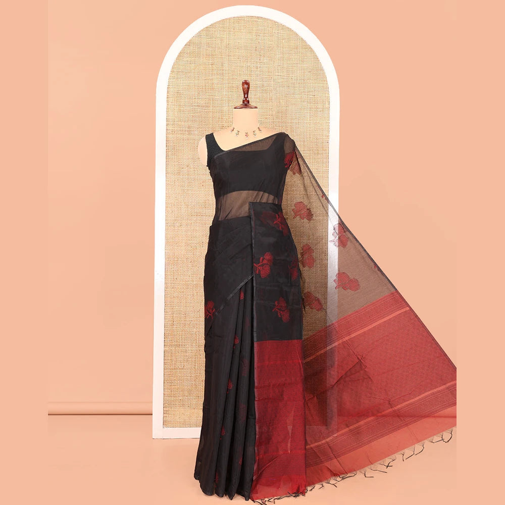 Pothys Borderless Black Semi-Silk Cotton Saree Features Floral Buttas, a Contrast Plain Pallu, and a Contrast Blouse