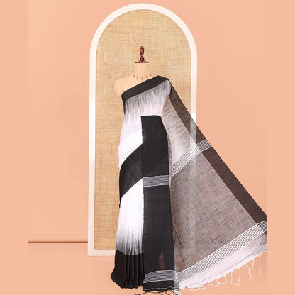 Pothys White Ikkat Weave Khadi Linen Saree, Complemented by a Contrast Border, and a Contrast Blouse