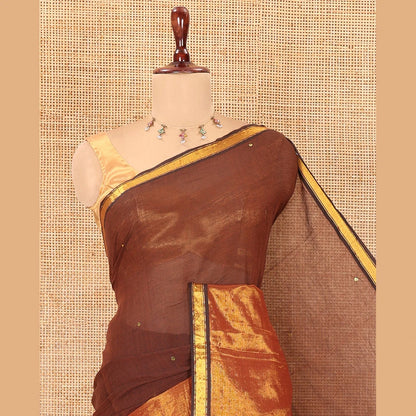 Pothys Brown Khadi Mul Cotton Saree, Gleamed Up with Sequins Work, a Golden Zari Border, Self-Pallu, and a No Blouse