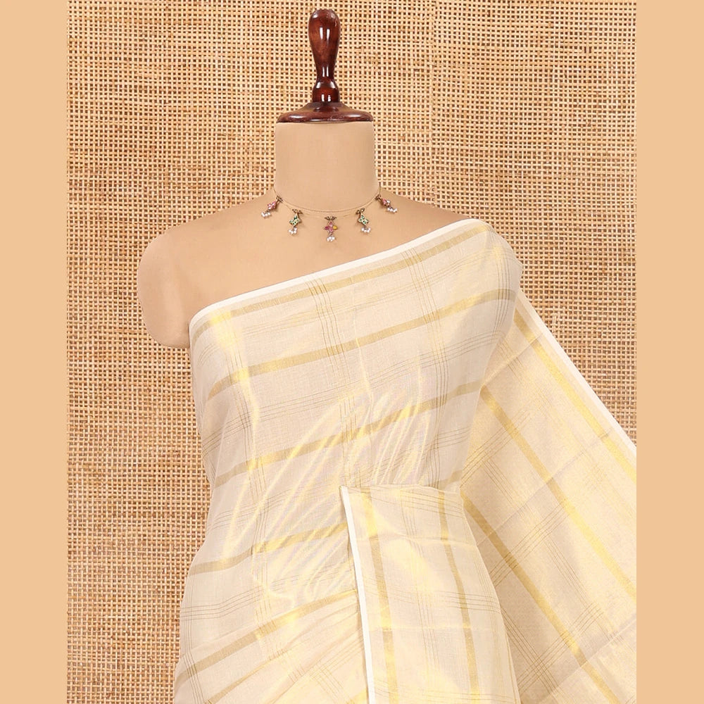 Pothys Borderless Gold Kerala Tissue Saree, Gleamed Up with Zari Checked Design, a Self-Pallu, and a Matching Blouse
