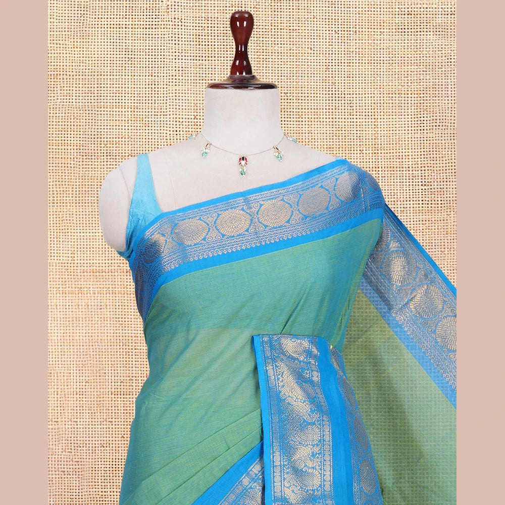 Pothys Sea Green Plain Chettinad Cotton Saree, Complemented by a Contrast Traditional Zari Rettai Pettu Border, and a Matching Blouse