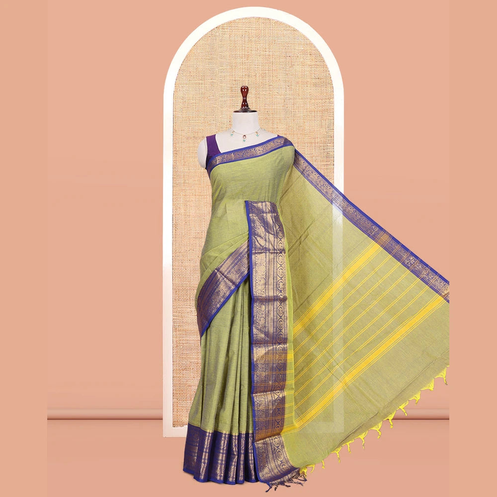 Pothys Elachi Green Plain Chettinad Cotton Saree, Complemented by a Contrast Traditional Zari Peacock-Elephant Border, a Matching Blouse
