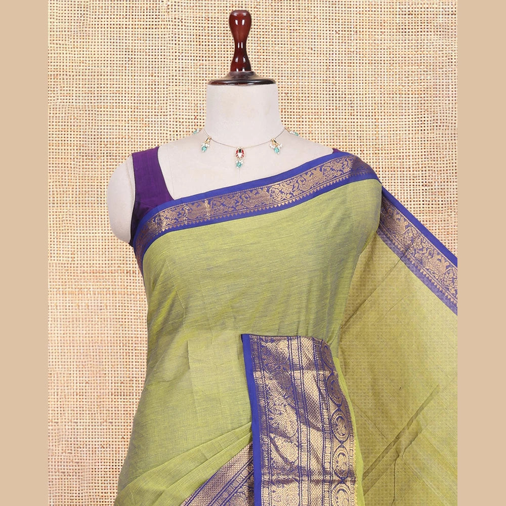 Pothys Elachi Green Plain Chettinad Cotton Saree, Complemented by a Contrast Traditional Zari Peacock-Elephant Border, a Matching Blouse