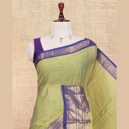 Pothys Elachi Green Plain Chettinad Cotton Saree, Complemented by a Contrast Traditional Zari Peacock-Elephant Border, a Matching Blouse