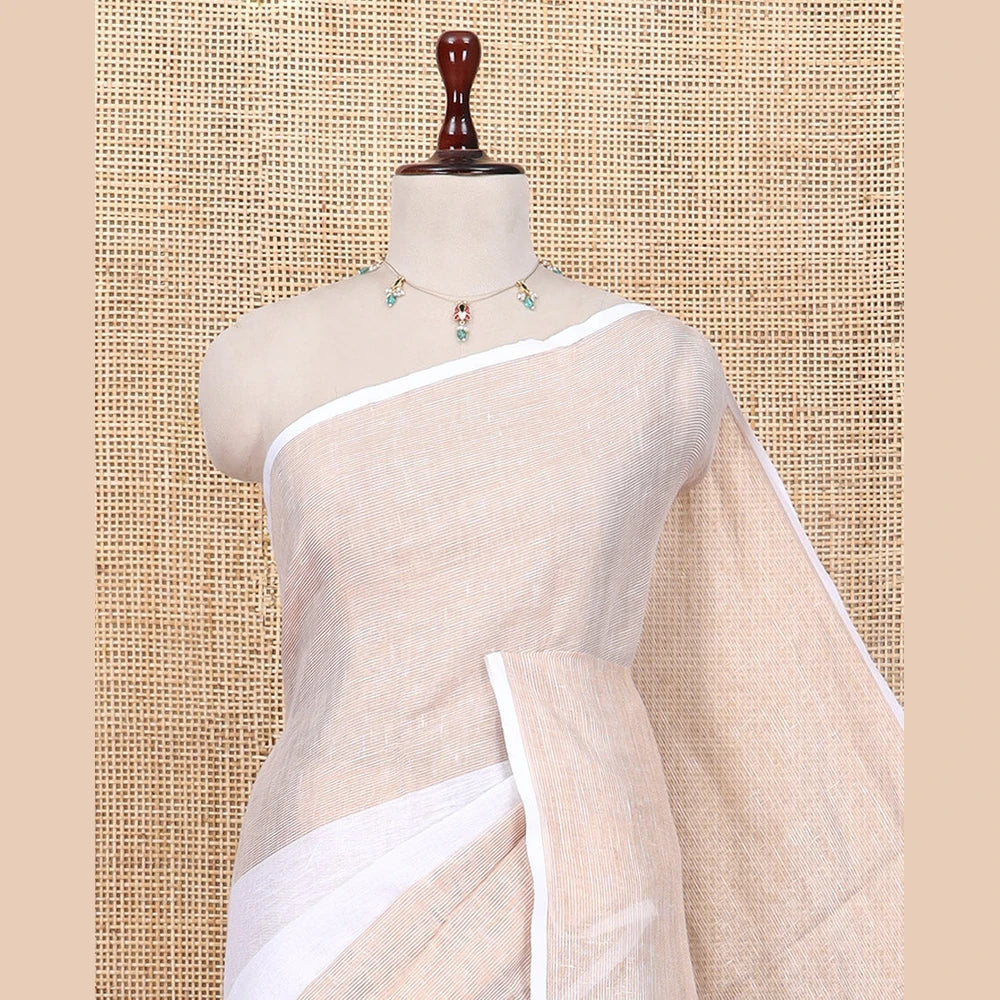 Pothys Borderless Off-White Linen Saree Flanked by Horizontal Zari Stripes, a Self-Pallu, and a Matching Blouse