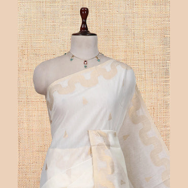 Pothys Cream Chanderi Cotton Saree, Adorned with Zari Buttas, Highlighted by Zari Border, Grand Pallu, and a Matching Blouse