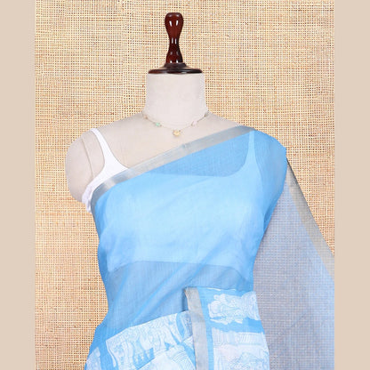Pothys Blue Linen Cotton Saree Features Kalamkari Human Figurines, a Piping Border, Kalamkari Pallu, Contrast Blouse