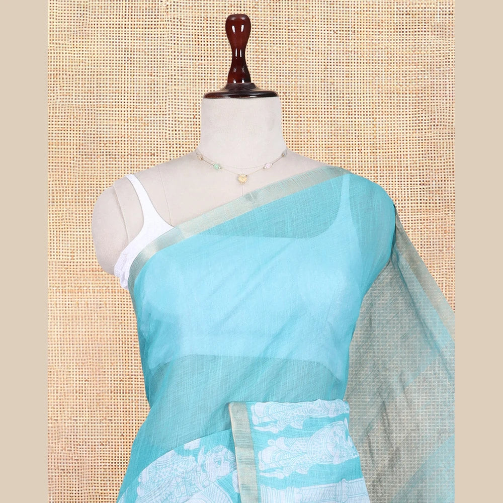 Pothys Teal Blue Linen Cotton Saree Features Kalamkari Human Figurines, a Piping Border, Kalamkari Pallu, Contrast Blouse