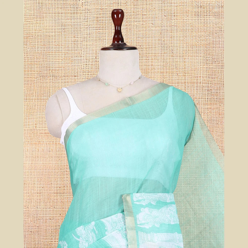 Pothys Sea Green Linen Cotton Saree Features Kalamkari Human Figurines, a Piping Border, Kalamkari Pallu, Contrast Blouse
