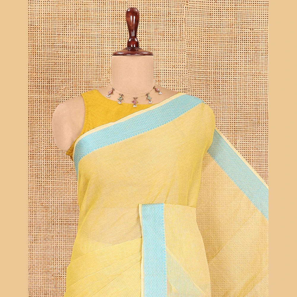 Pothys Yellow Striped Chettinad Cotton Saree, a Traditional Thread Border, and a Contrast Blouse