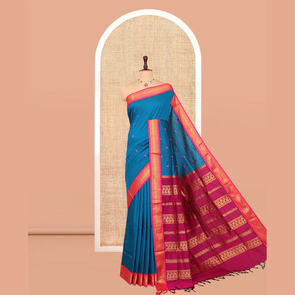 Pothys Blue Kalyani Cotton Saree, Woven with Thread Buttas, Complemented by a Contrast Traditional Border, Traditional Pallu, and a Contrast Blouse