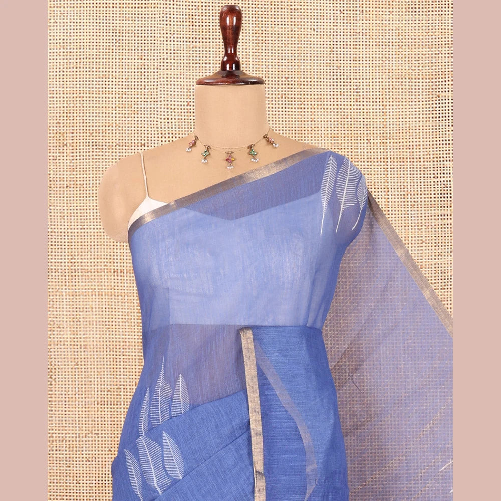 Pothys Blue Linen Cotton Saree Features Tree Print, a Zari Piping Border, and a Matching Blouse