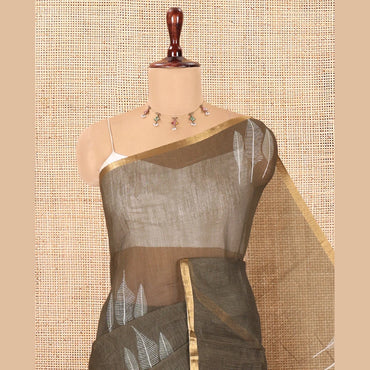 Pothys Olive Green Linen Cotton Saree Features Tree Print, a Zari Piping Border, and a Matching Blouse