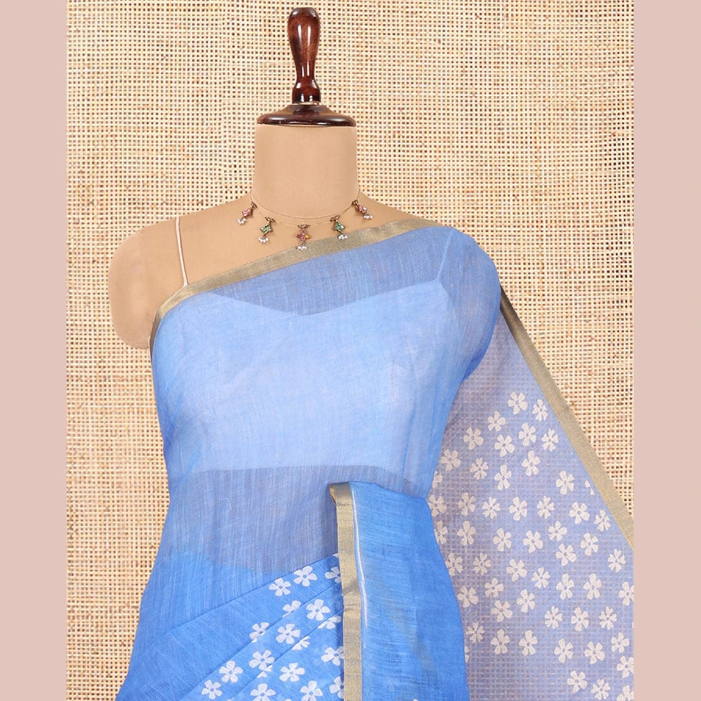 Pothys Blue Linen Cotton Saree Features Half-And-Half-Style Flower Motifs Print, a Piping Border, and a Matching Blouse
