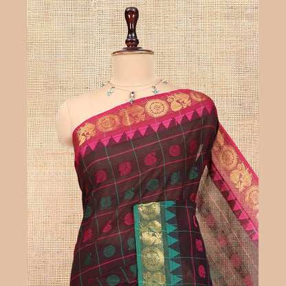Pothys Brown Chettinad Cotton Saree Features Butta Enclosed Checks, a Contrast Temple Annam-Peacock Ganga-Jamuna Border, and a Matching Blouse