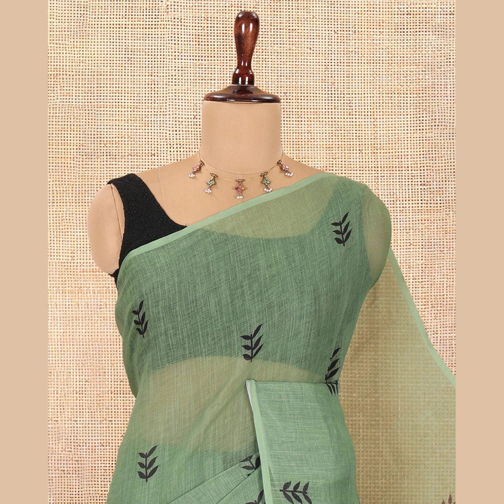 Pothys Borderless Olive Green Linen Cotton Saree with Leaf Print, a Contrast Leaf-Printed Pallu, and Contrast Blouse