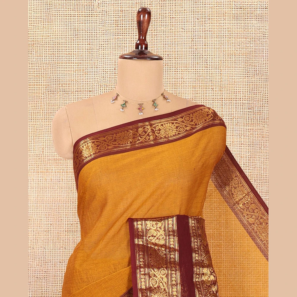 Pothys Mustard Plain Chettinad Cotton Saree, a Contrast Rettai Pettu Traditional Zari Border, Striped Pallu, and a Matching Blouse