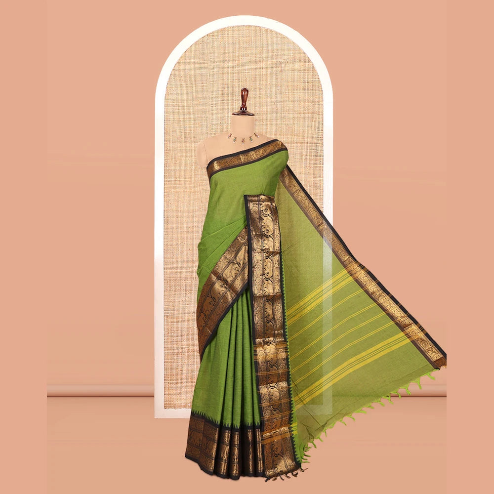 Pothys Green Plain Chettinad Cotton Saree, a Contrast Temple Elephant-Peacock Zari Border, Striped Pallu, and a Matching Blouse