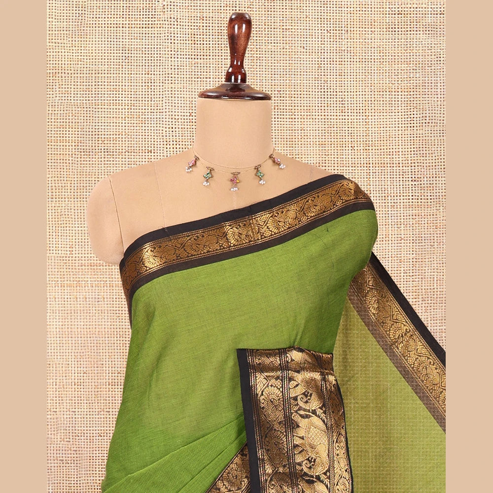Pothys Green Plain Chettinad Cotton Saree, a Contrast Temple Elephant-Peacock Zari Border, Striped Pallu, and a Matching Blouse