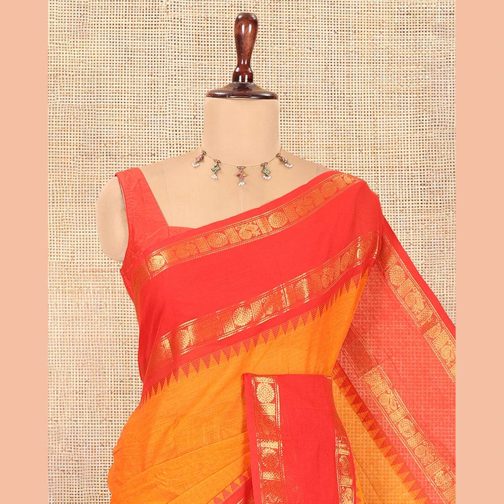 Pothys Orange Plain Chettinad Cotton Saree, a Contrast Rettai Pettu Peacock-Chakra Temple Border, Striped Pallu, a Matching Blouse