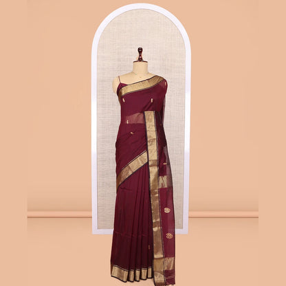 Pothys Maroon Maheshwari Cotton Saree, Adorned with Buttas, Highlighted by a Traditional Zari Border, Pallu Gleamed Up with Zari Buttas, and a Matching Blouse