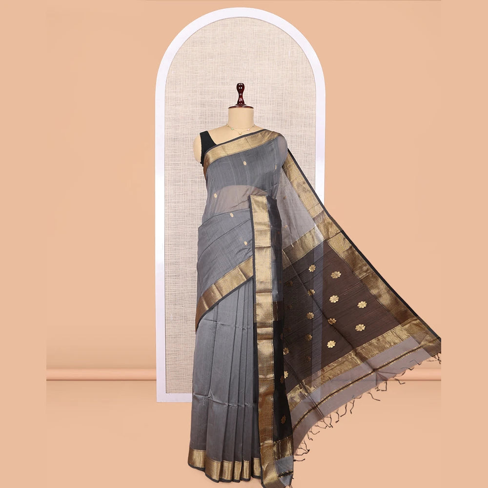 Pothys Grey Maheshwari Cotton Saree, Embellished with Buttas, Highlighted by a Traditional Zari Border, Pallu Gleamed Up with Zari Buttas, and a Contrast Blouse
