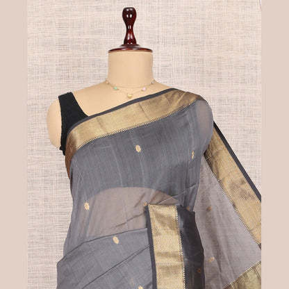 Pothys Grey Maheshwari Cotton Saree, Embellished with Buttas, Highlighted by a Traditional Zari Border, Pallu Gleamed Up with Zari Buttas, and a Contrast Blouse