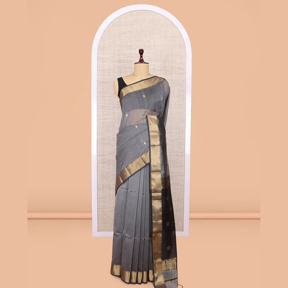 Pothys Grey Maheshwari Cotton Saree, Embellished with Buttas, Highlighted by a Traditional Zari Border, Pallu Gleamed Up with Zari Buttas, and a Contrast Blouse