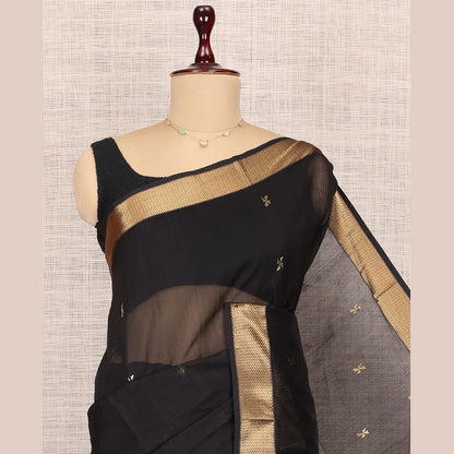 Pothys Black Maheshwari Cotton Saree, Accentuated with Buttas, Highlighted by a Traditional Zari Border, Pallu Gleamed Up with Zari Buttas, and a Matching Blouse