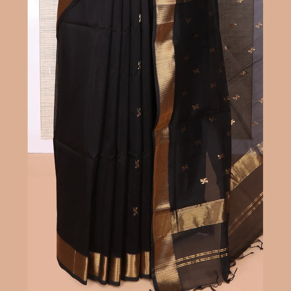 Pothys Black Maheshwari Cotton Saree, Accentuated with Buttas, Highlighted by a Traditional Zari Border, Pallu Gleamed Up with Zari Buttas, and a Matching Blouse