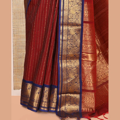 Pothys Maroon-Royal Blue Chettinad Cotton Saree, Adorned with Zari Stripes, a Contrast Peacock Traditional Border, Grand Pallu, a Matching Blouse