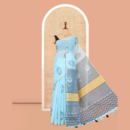 Pothys Borderless Blue Linen Cotton Saree, Beautified with Face Print, Contrast Pallu of Chevron Stripes and Face Print, a Contrast Blouse