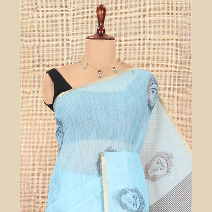 Pothys Borderless Blue Linen Cotton Saree, Beautified with Face Print, Contrast Pallu of Chevron Stripes and Face Print, a Contrast Blouse