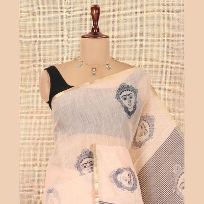 Pothys Borderless Chikoo Linen Cotton Saree Showcasing Face Print, Contrast Pallu of Chevron Stripes and Face Print, a Contrast Blouse