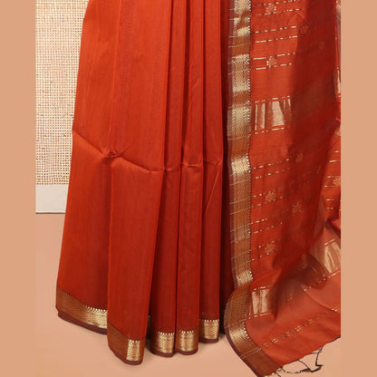 Pothys Rust Maheshwari Cotton Saree Featuring Zari Buttas, a Contrast Traditional Zari Border, Zari Striped Pallu, and a Matching Blouse